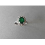 Emerald & diamond cluster ring,2.55ct oval natural emerald (treatment oil),12x0.05ct diamonds h