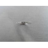 0.32ct diamond band ring set in 9ct white gold. Small brilliant cut diamonds, I colour and i1