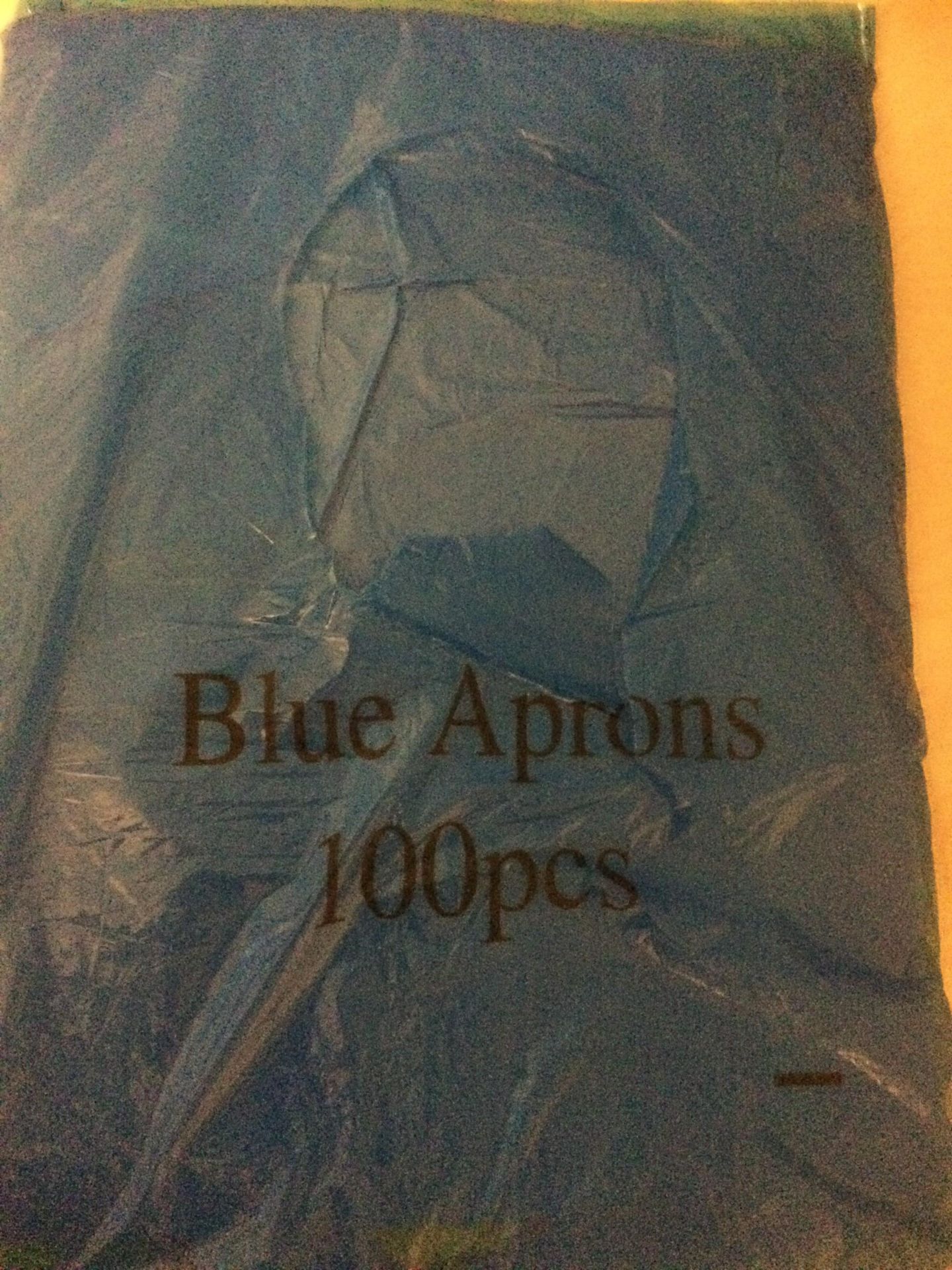 1 x bx of blue polythene appons 10 x 100 despenser