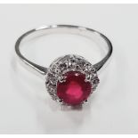1.56 Carat Ruby and Diamond Halo Engagement Ring in White Gold