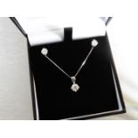 0.35ct / 0.70ct diamond pendant and earring set in platinum. Pendant - 0.35ct brilliant cut diamond,