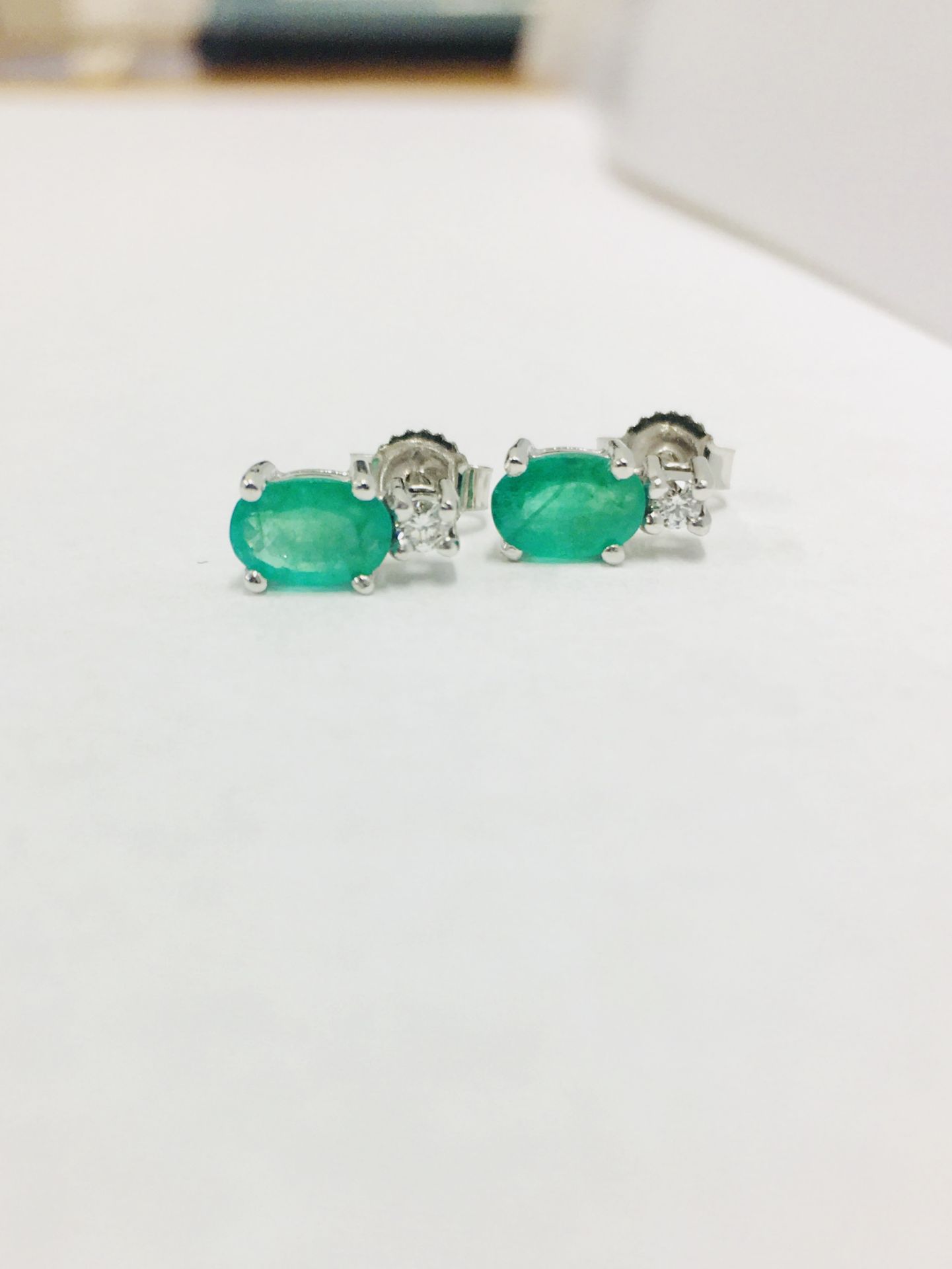 Emerald and Diamond drop earrings. Each set with a 7 x 5mm oval cut emerald ( treated), 1.60ct - Image 3 of 3