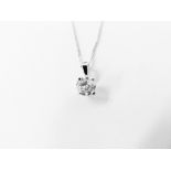 0.50ct diamond solitaire pendant set in 18ct gold. 4 claw setting, plain bale. Enhanced brilliant