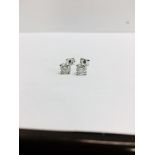 0.90ct Solitaire diamond stud earrings set with brilliant cut diamonds. I1 clarity and I colour. Set