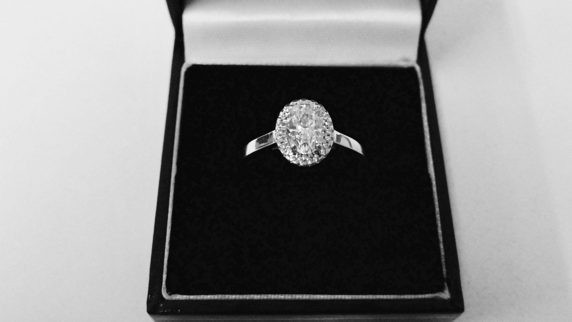 0.95ct diamond set solitaire ring set in platinum. Oval cut diamond, I colour and VS clarity,