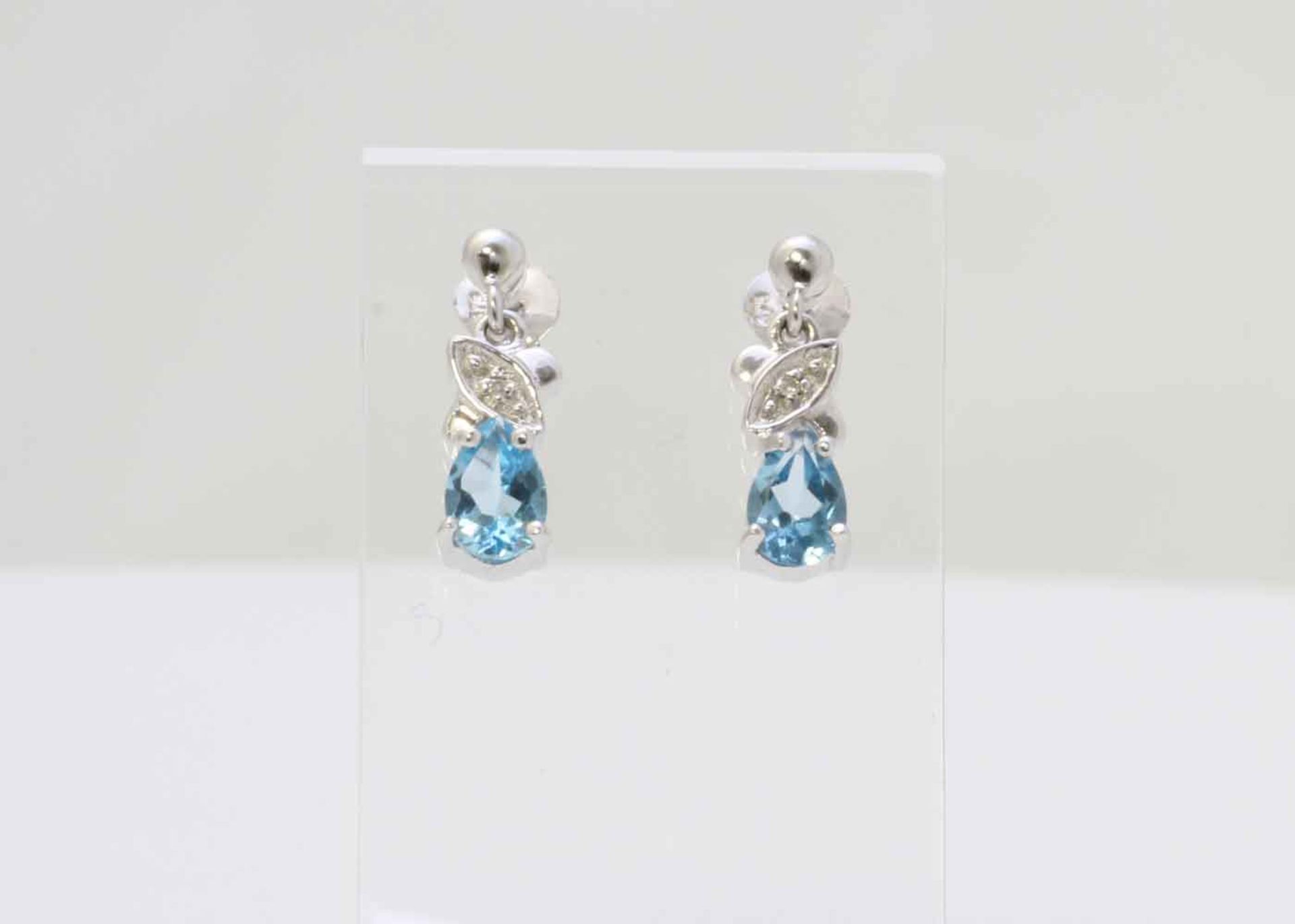 9ct White Gold Diamond And Blue Topaz Earring 0.01