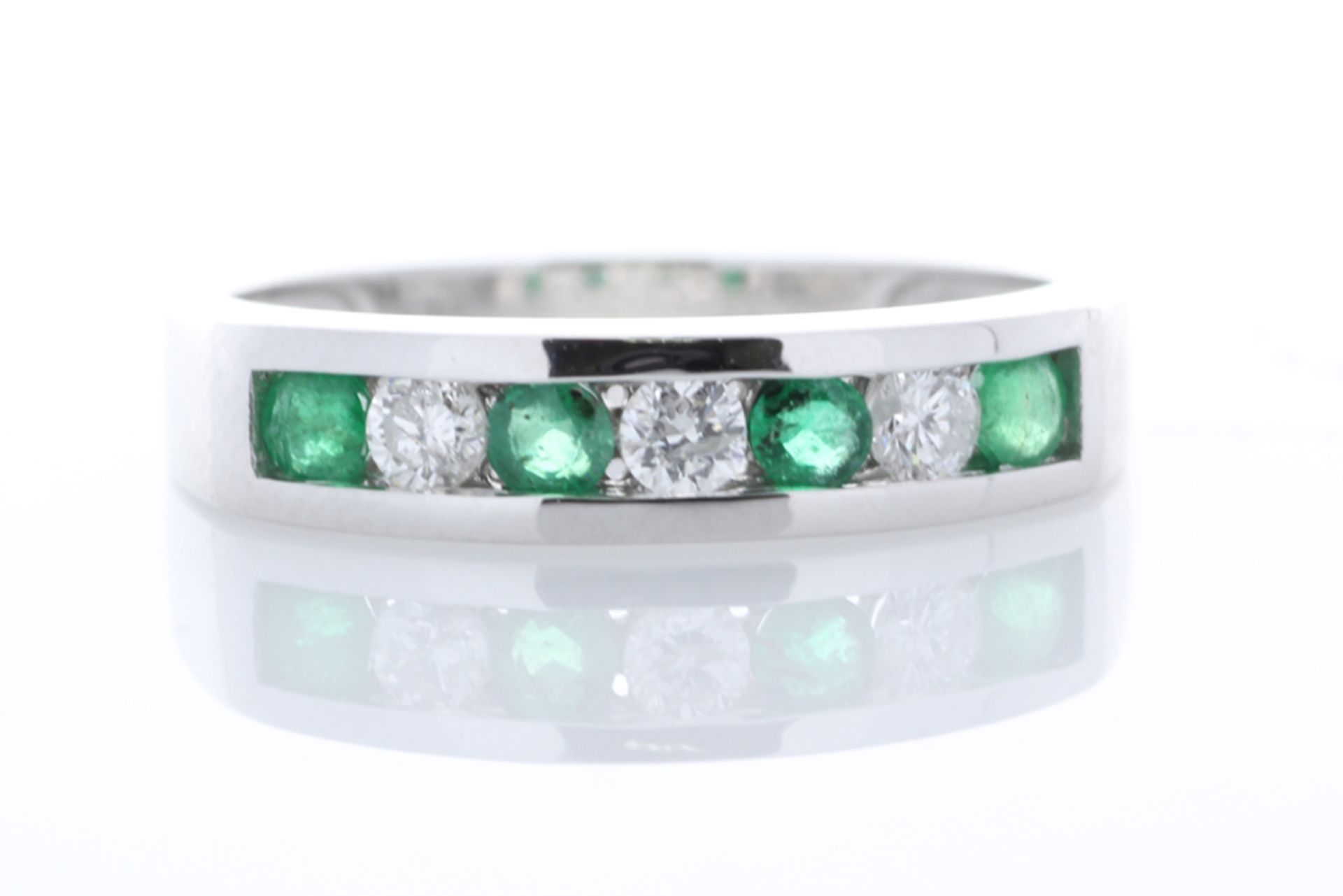 9ct White Gold Channel Set Semi Eternity Diamond And Emerald Ring 0.25