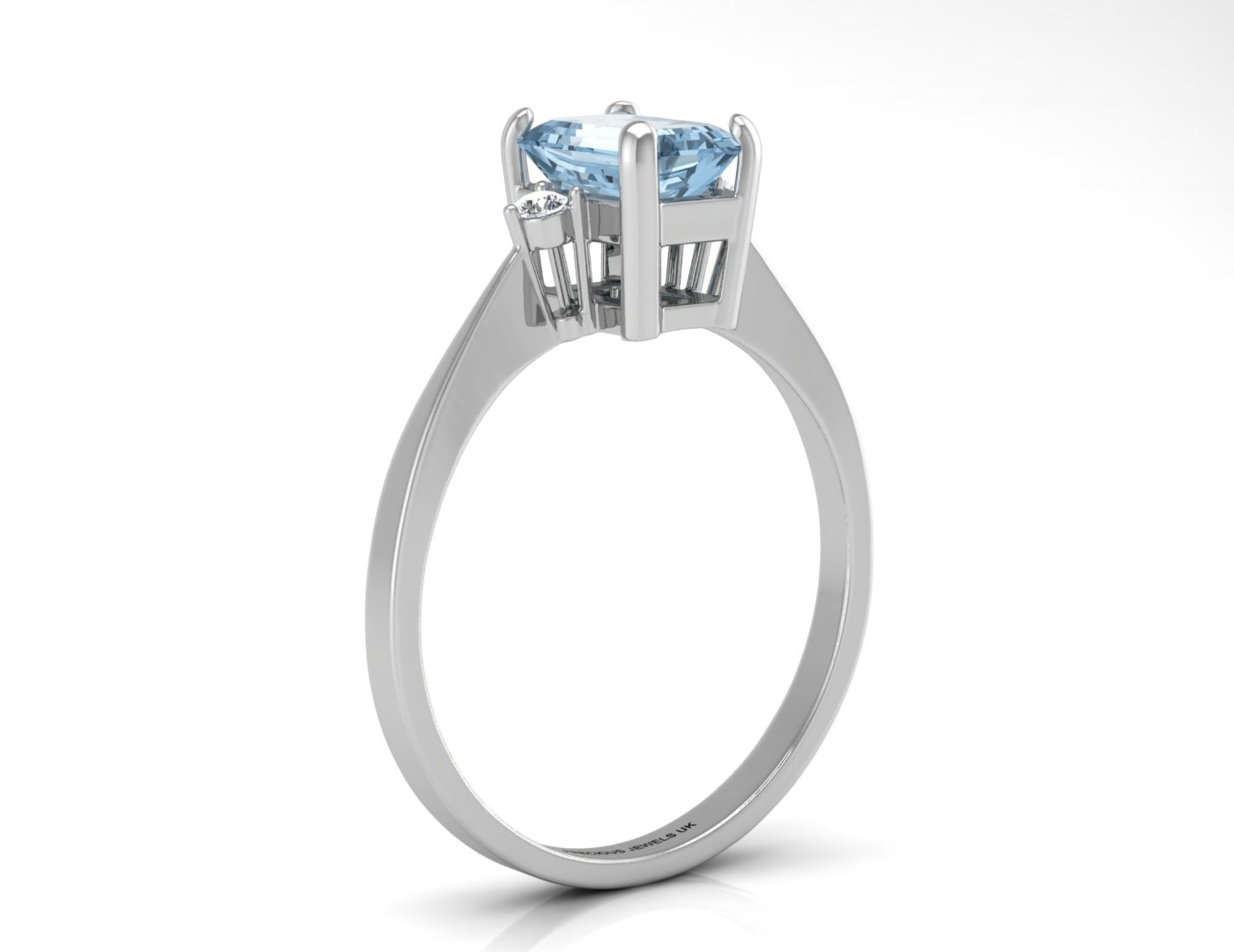 9ct White Gold Diamond And Emerald Cut Blue Topaz Ring 0.04 - Image 2 of 5