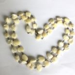 Vintage brass and Mother of Pearl natural beads double strand necklace