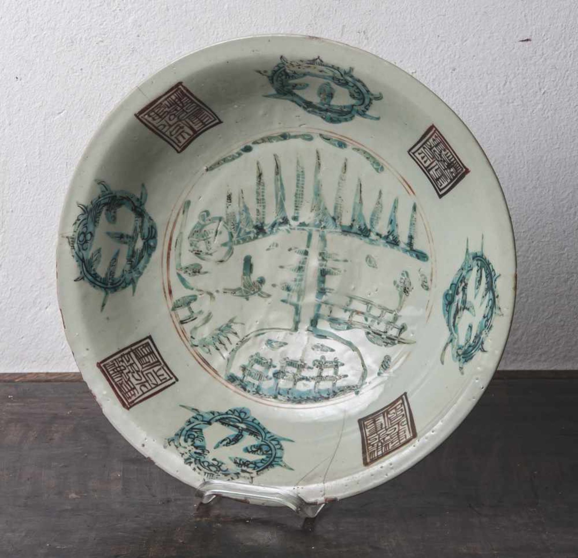Teller, China, wohl Qing Dynastie, 18./19. Jahrhundert, rotbrauner Scherben, Seladon, mit