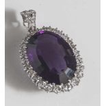 Amethyst-Brillant-Anhänger, Weißgold 750, ausgefasst mit 1 großen oval-facettierten Amethysten,