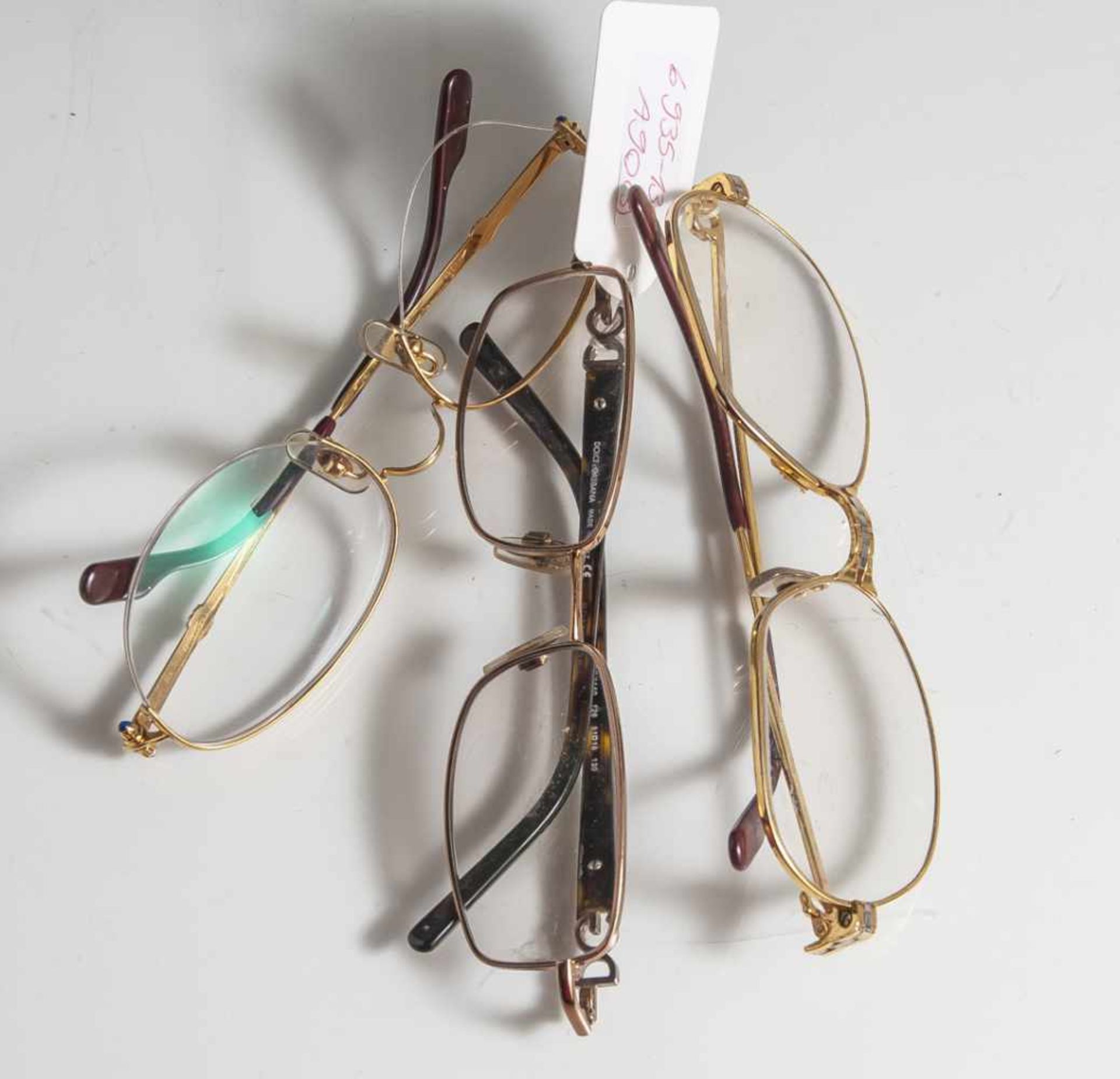 3 Brillengestelle, Vintage, 2 x Cartier, 1 x Dolce & Gabbana. Z. T. etw. verbogen, 1 Nasensteg