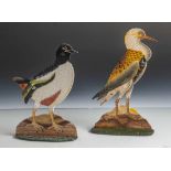 Zwei Aufsteller, Metall, farbig bemalt, Darstellung zweier Vogelfiguren. H. ca. 26,5 bzw. 24 cm.