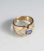 Damenring, Gelbgold 585, Bandring, ausgefasst mit 18 Brillanten, ca. 0,36 ct und 1 mittelblauem