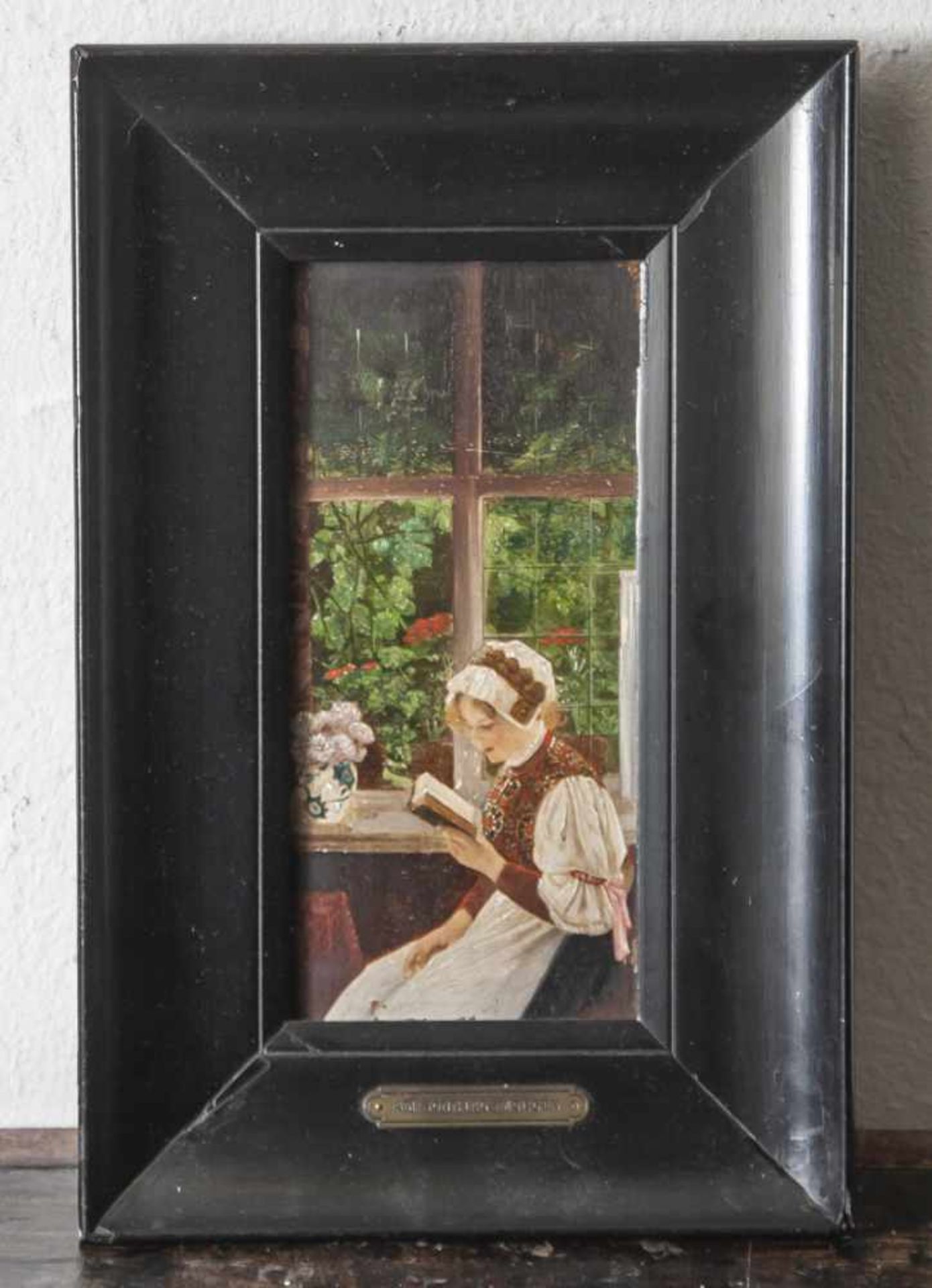 Unbekannter Maler (um 1900), Junge Frau am Fenster ein Buch lesend, Öl/Holz, bez. "Am