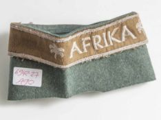 Afrika-Ärmelband, III. Reich, Kamelhaar, gestickte Ausführung, Zustand III, noch an Uniformabschnitt