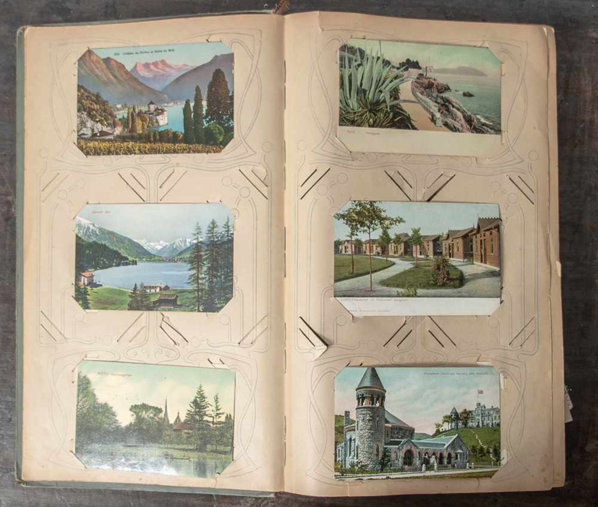 Postkartenalbum, um 1900, ca. 249 versch. Postkarten. Ca. 39 x 24 cm, Einband besch., stockfleckig.