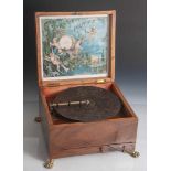 Polyphon um 1900 (funktionsfähig), Aufziehhebel vorne am Kasten, Platten ca. 20,5cm im Durchm. Größe