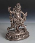 Mahakala, 2-teilig, China, Anfang 20. Jahrhundert, Bronze versilbert, farbige Glaspaste,die Gottheit