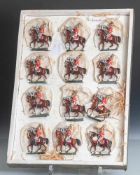Zinnfiguren, Musiker zu Pferde der Garde du Corps, fein bemalt m. orig. Schachtel, 12Stück, Plast.