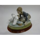 LLadro - Girl feeding ducks