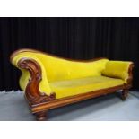 A Victorian mahogany chaise longe