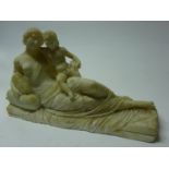 Marble classical reclining figure and child, damaged