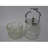 A cut glass biscuit barrel with electroplate mounts, a cut glass jar