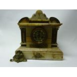 A French gilt metal and onyx mantle clock