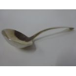 A silver Old English pattern table spoon