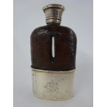 A Silver and glass spirit flask