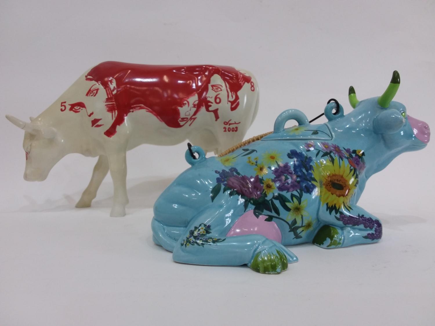 2 Ceramic cows