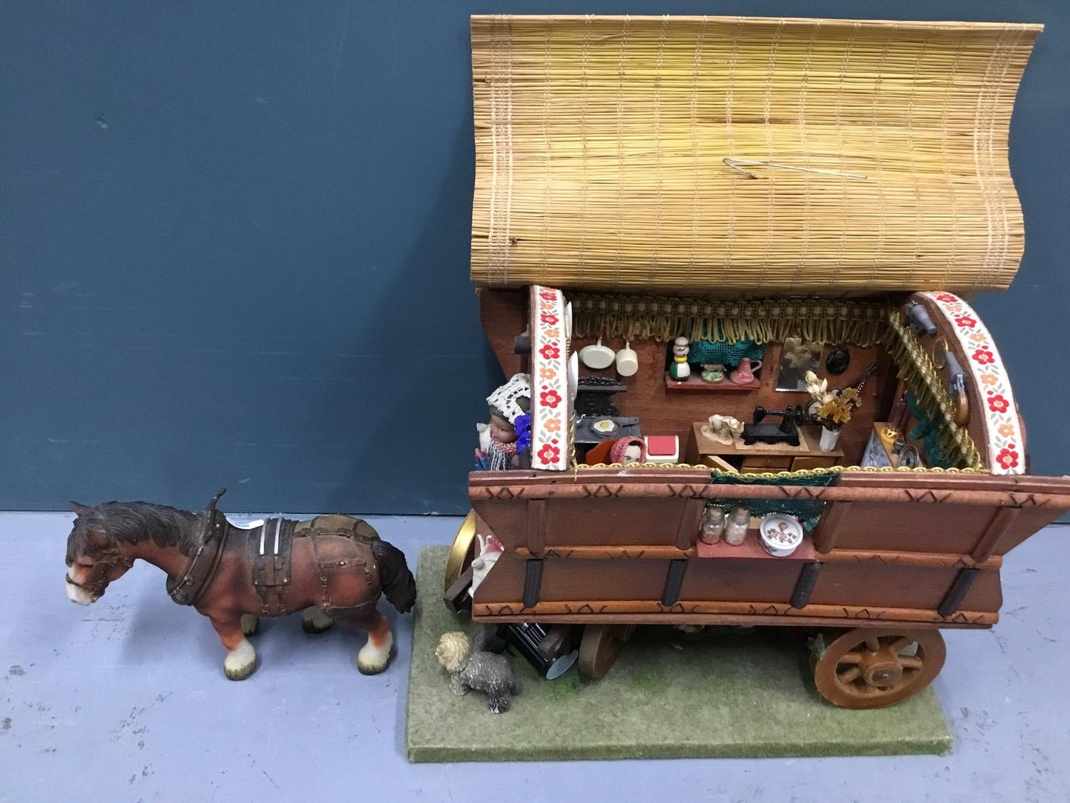 20th century model of a shire horse with wooden cart and young Dutch girl