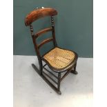 Early 20th century mahogany rocking chair with cane seat