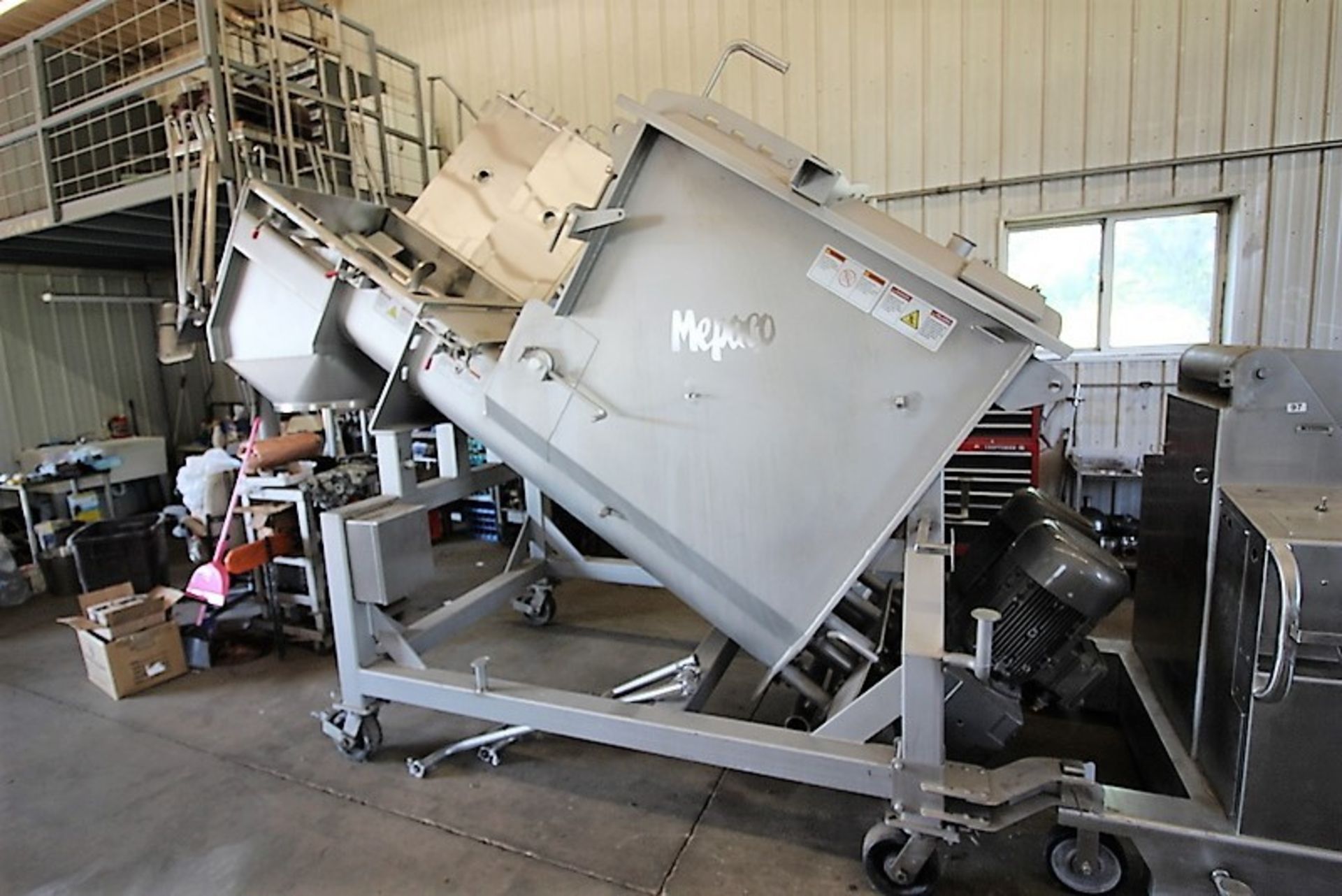 Meepaco double screw inclined blender with a 48"x40"x48" hopper, twin drives on auger 10'6"L x 7'6"H