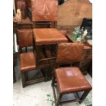 Set of four leather dining chairs