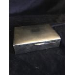 A stainless steel cigarette box