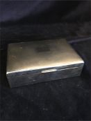 A stainless steel cigarette box