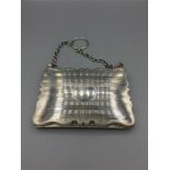 A Ladies Chatalaine purse 41/8" x 3" on short silver chain, striped, cartouche centre, containing