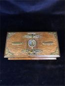 An oak cigar and cigarette box with integral cutter