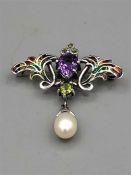 A silver plique A jour brooch/pendant with amethyst and freshwater pearl drop