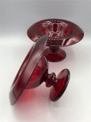 A pair of ruby glass vases