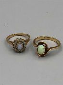 Two 9ct gold rings with opals (5g)