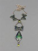 A silver and enamel art Nouveau style necklace