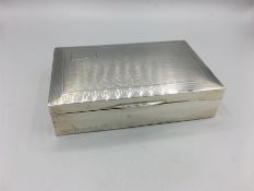 A silver cigarette box