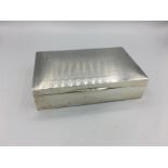 A silver cigarette box