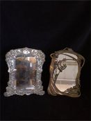 Two small mirrors one in white metal and one in an art nouveau style