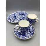 Royal Crown Derby blue and white two side plates, two teacups and a saucer.