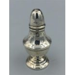 A silver salt 2 1/2" tall hallmarked Birmingham 1921/2