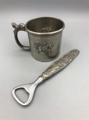 A Pewter cup and bottle opener